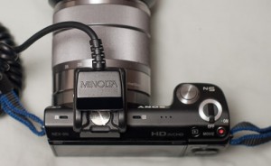 Top view of the flash adapter with a sync cord attached